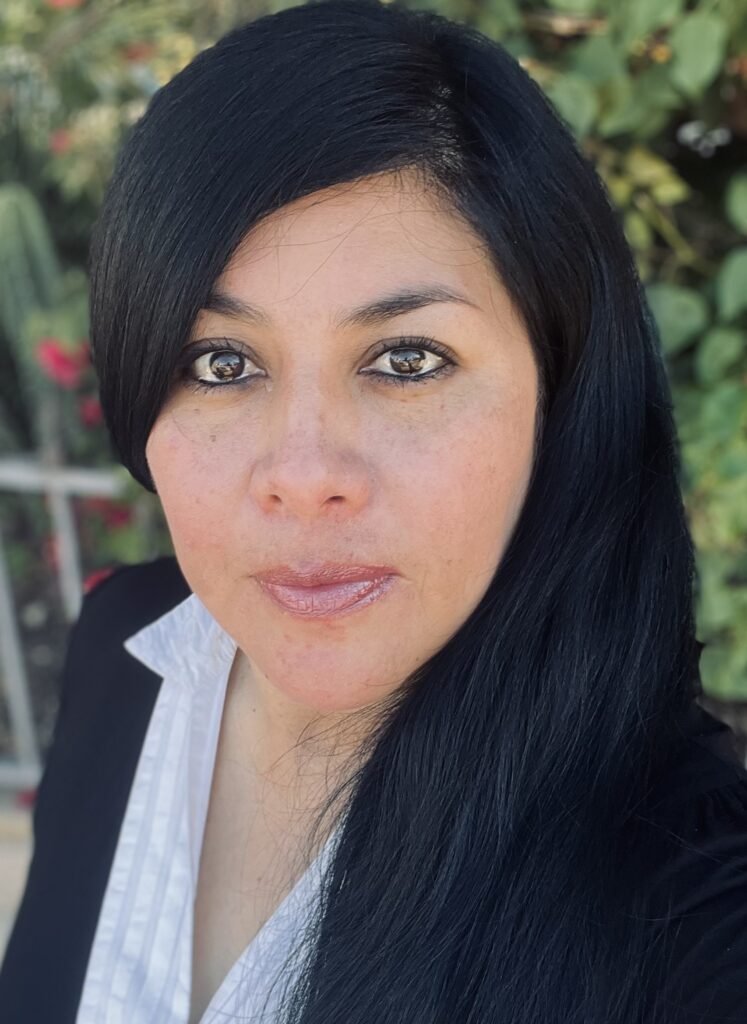 A professional photo of Gabby Woodard, HR Director of SEC1 Security